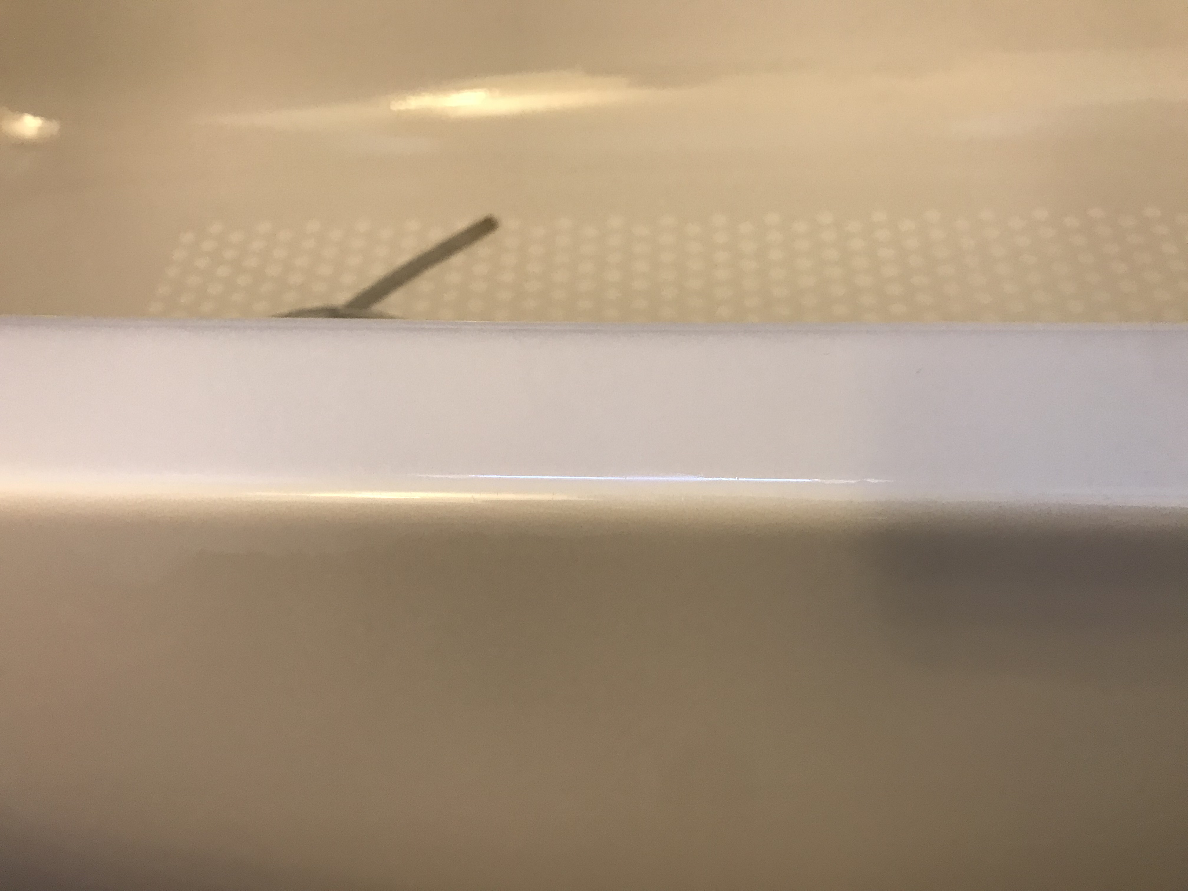 Bathtub refinishing spot repair after - NuFinishPro