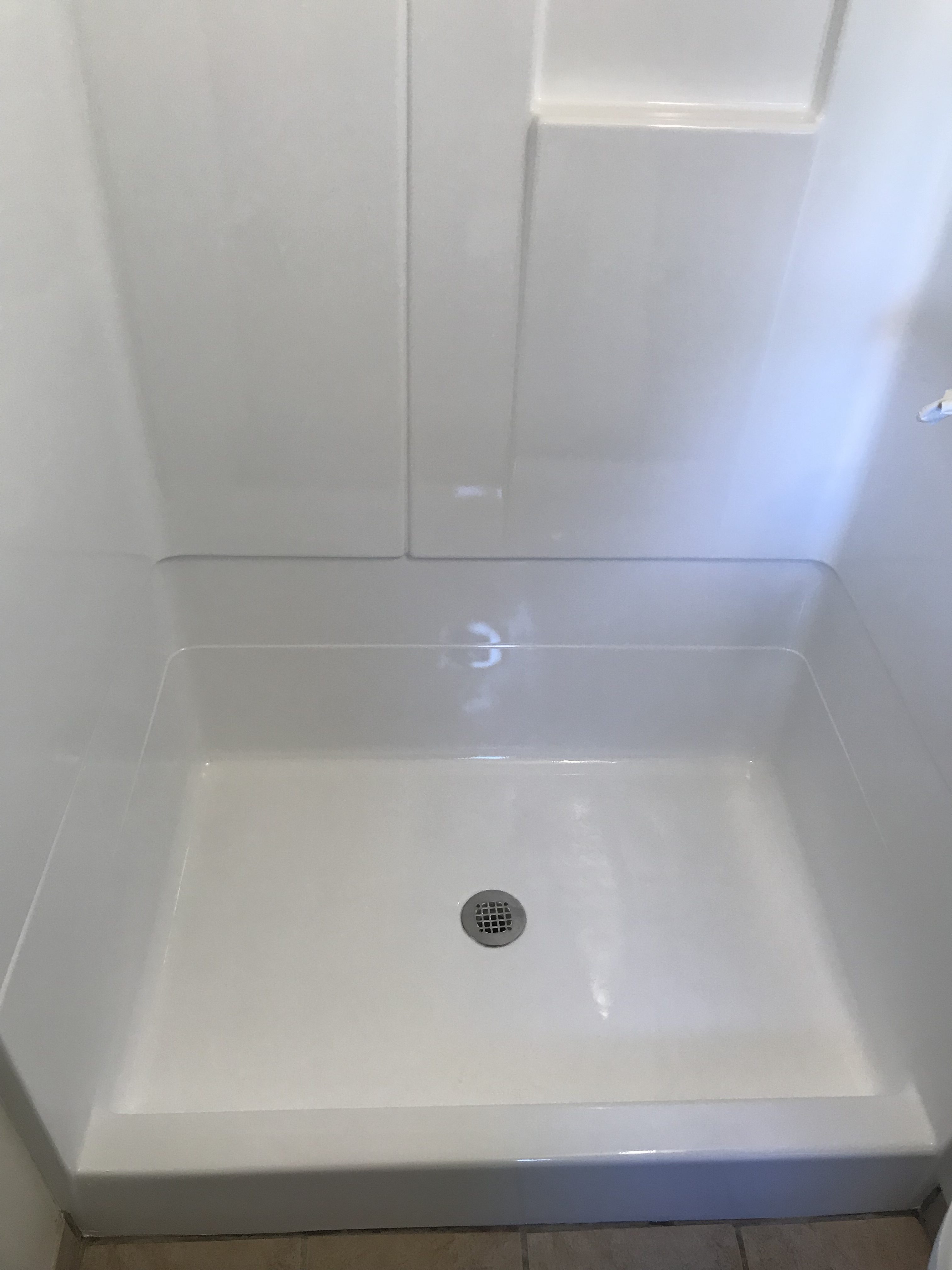 Shower resurfacing, shower pan spot repair after - NuFinishPro