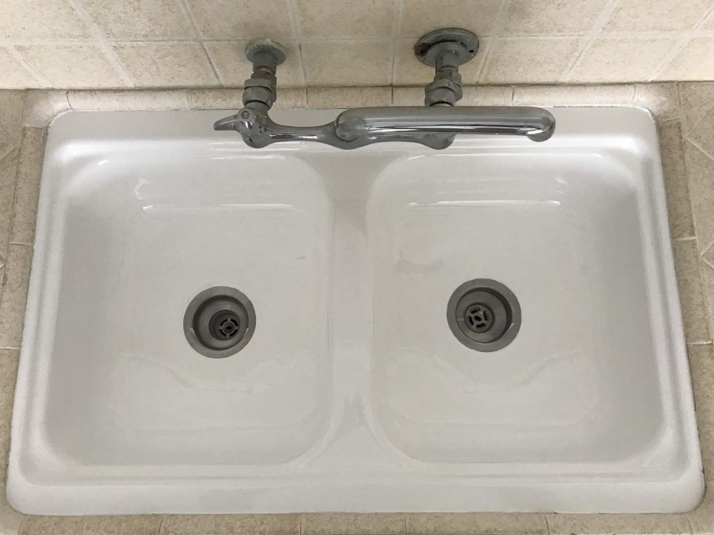 Kitchen sink reglazing, spot repairs after - NuFinishPro