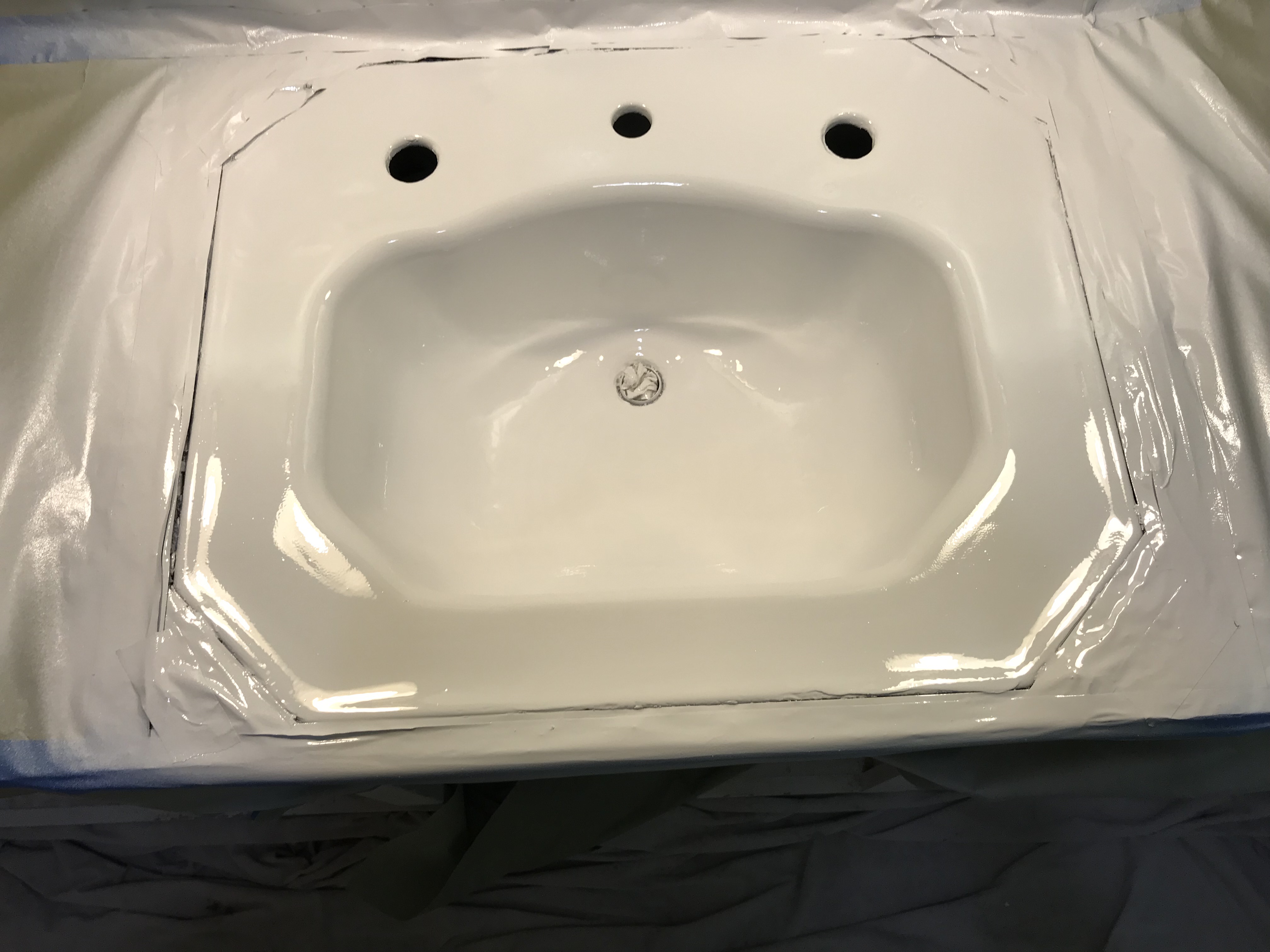 Sink after reglazing/refinishing Sink re-glazing after - NuFinishPro
