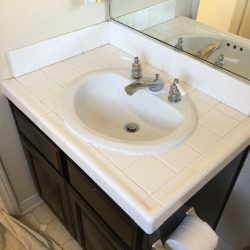 Bathroom refinishing, sink re-glaze, tile resurfacing before - NuFinishPro