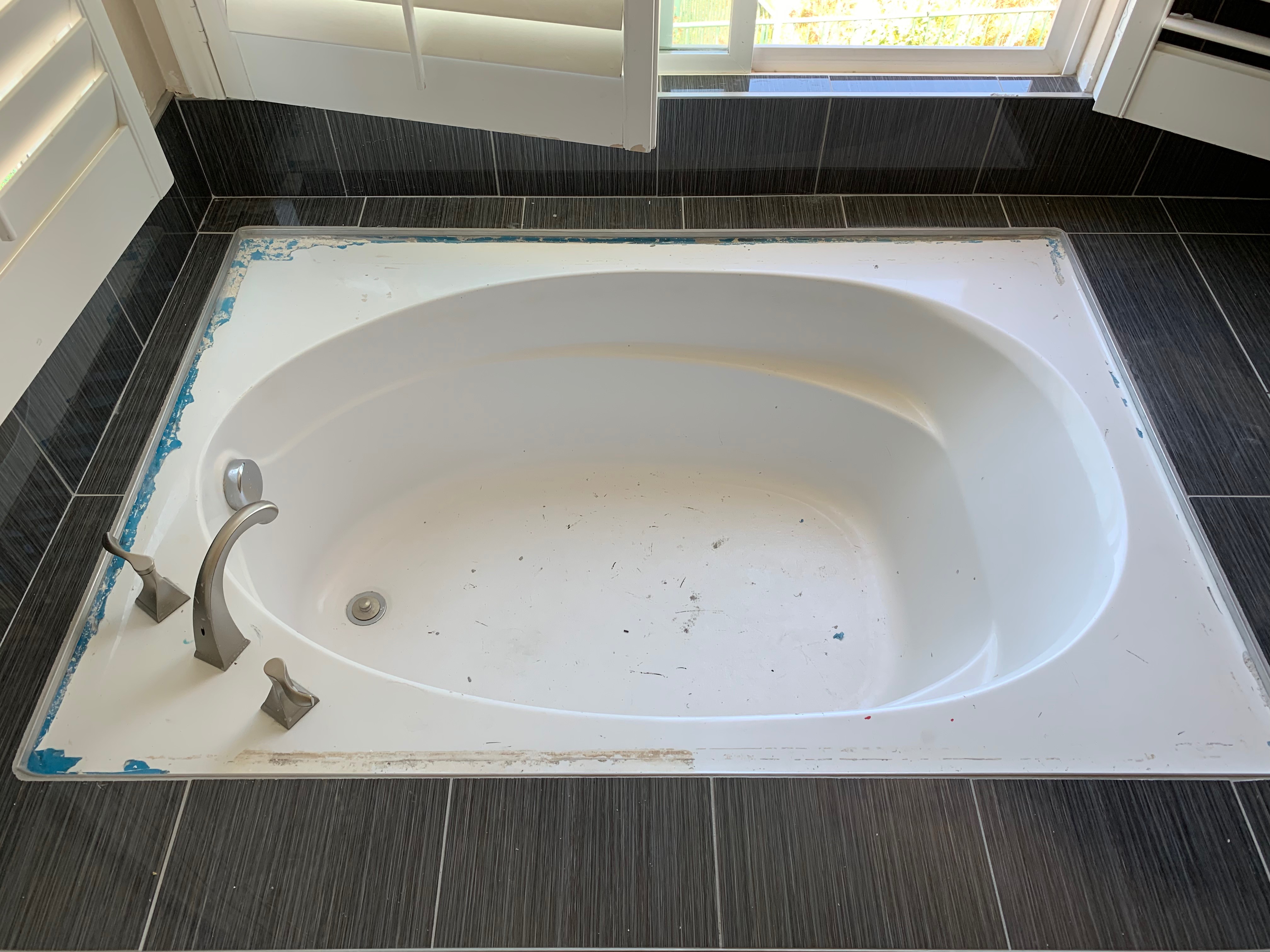 Large sauna tub refinishing before work - NuFinishPro
