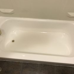 Bathtub refinishing, spot repair the rust damage after - NuFinishPro