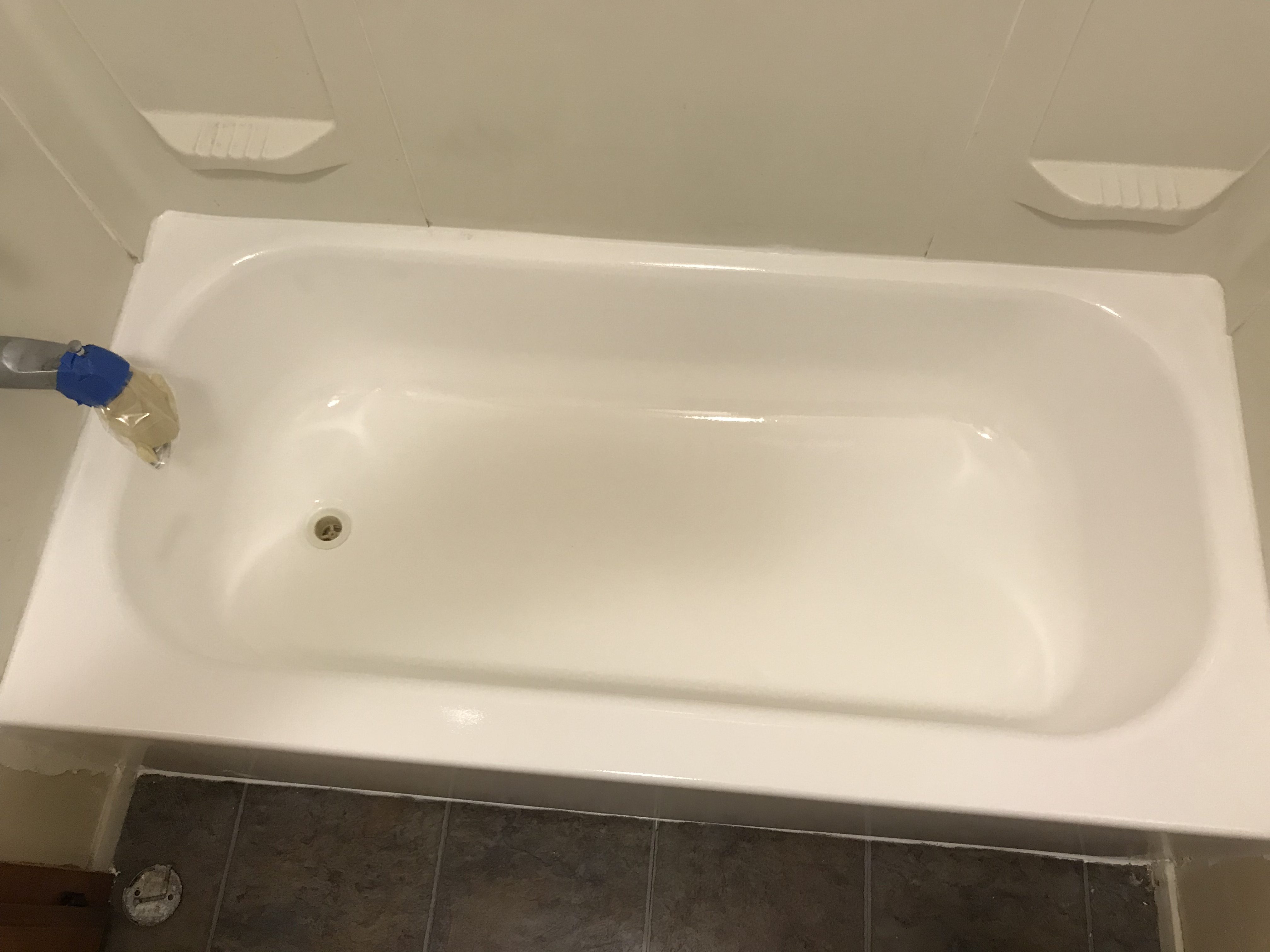Bathtub refinishing, spot repair the rust damage after - NuFinishPro