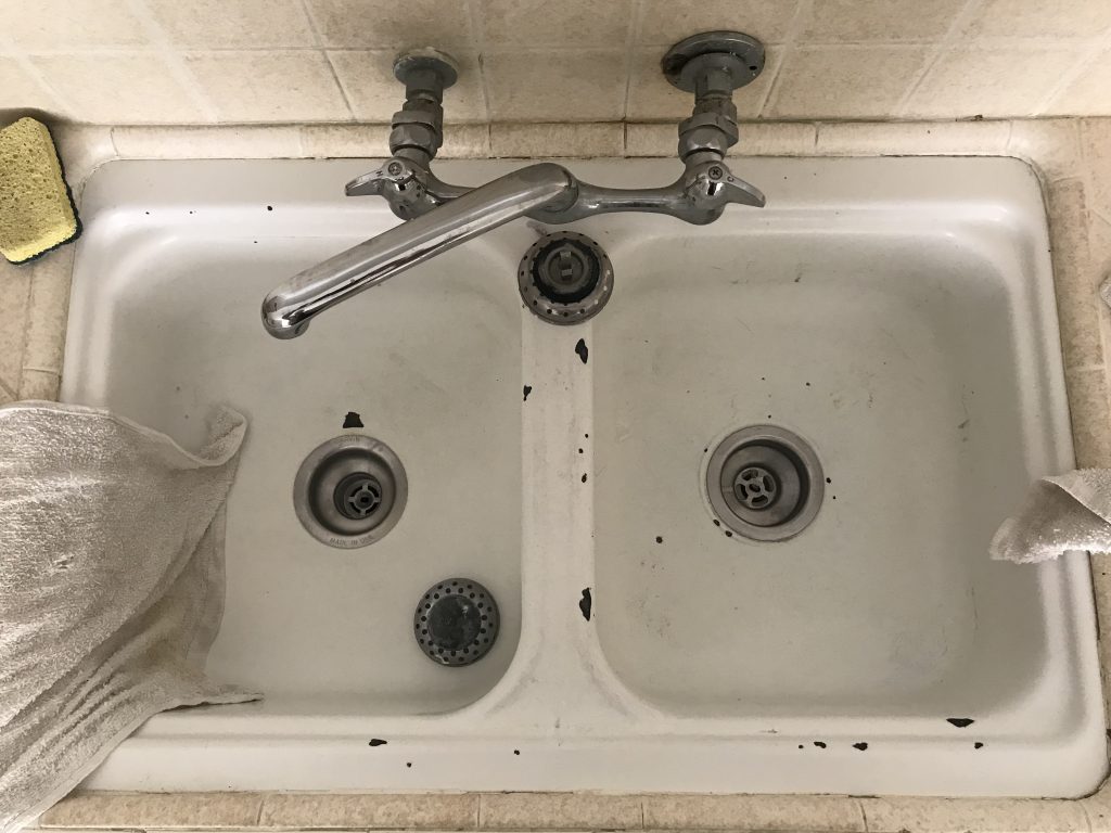 Kitchen sink reglazing, spot repairs before - NuFinishPro