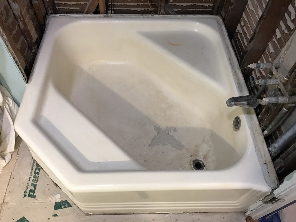 Large bathtub refinishing, spot repairs before work- NuFinishPro