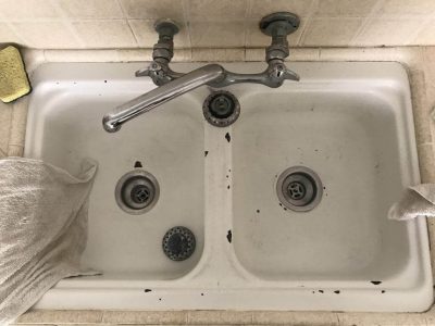 Sink refinishing before Sink re-glazing, and spot repairs before work done- NuFinishPro