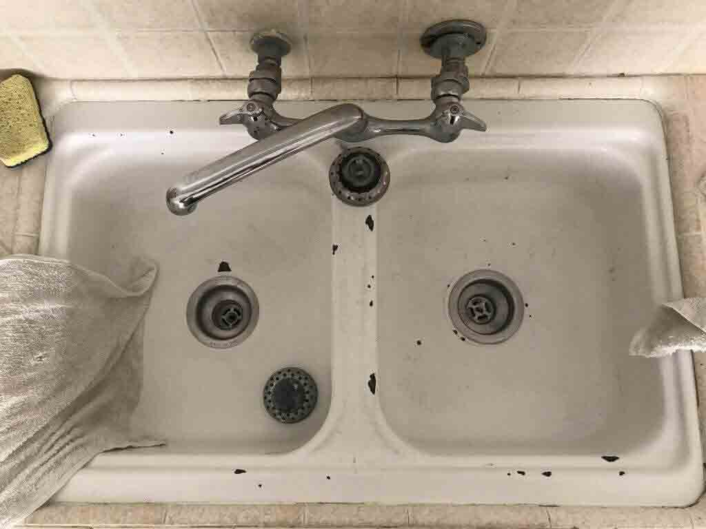 Sink before reglazing Kitchen sink before sink reglaze